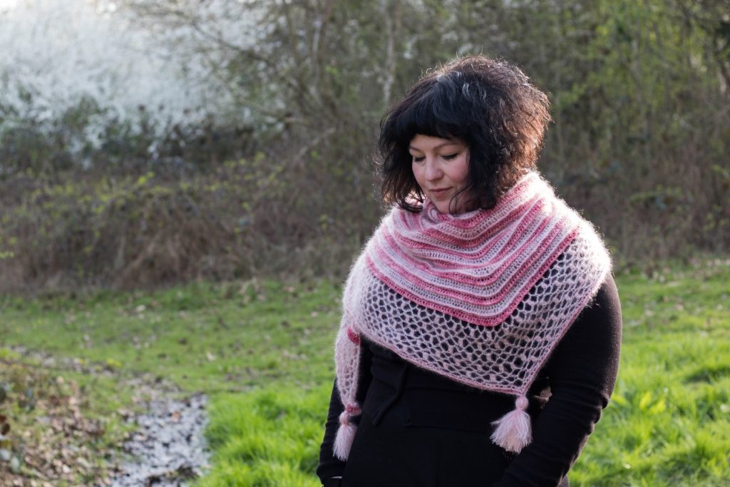 Anna Nikipirowicz modelling a crocheted shawl